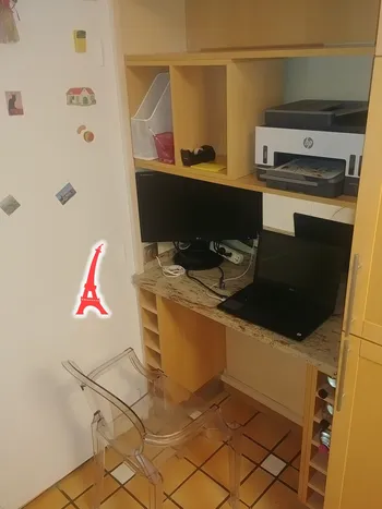 Office desk with printer and laptop