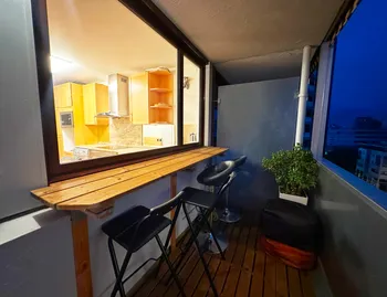 Balcony bar with kitchen view