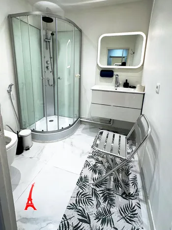 Modern shower with illuminated mirror